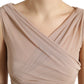 Dolce & Gabbana Elegant Beige V-Neck Sleeveless Sheer Top